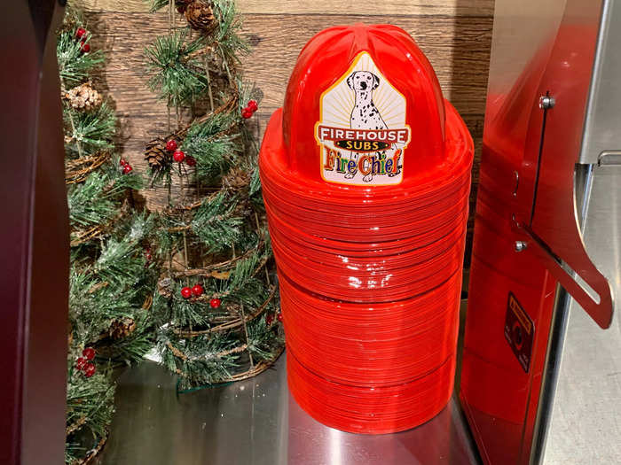 The theme is used fairly heavily throughout the restaurant, with plastic fire fighter hats available for kids.