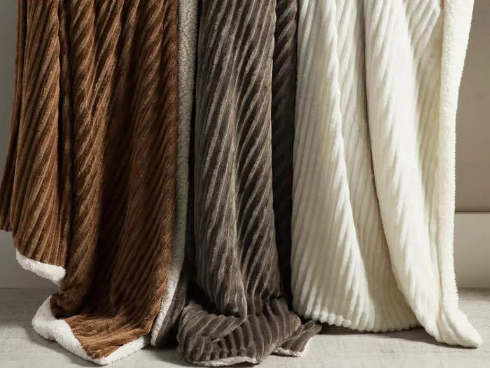 Get cozy near the fireplace with cashmere or faux fur throw blankets.