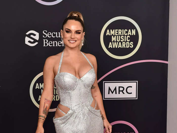 Jojo embraced the visible trend thong in her silver Usama Ishtay dress.