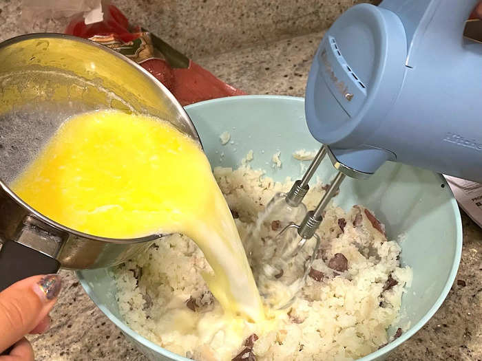 Then I slowly added the hot cream and butter to the potatoes while mixing on the lowest speed.