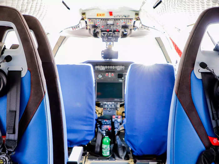 Inside the aircraft resembles more of a helicopter cabin than it does a traditional private aircraft. Maneuvering in the cabin requires crouching and there isn