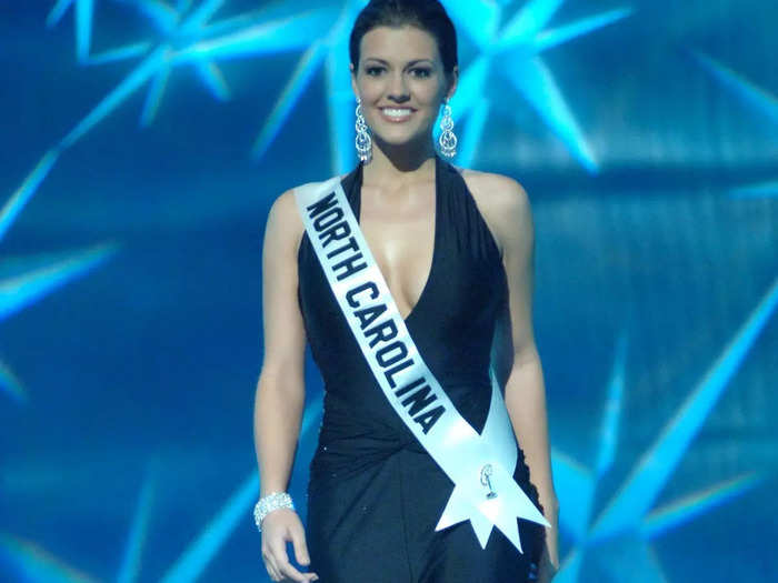 Miss USA 2005 Chelsea Cooley looked chic in a black gown with a plunging neckline and slit.