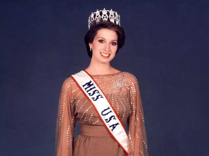 Miss USA 1982 Terri Utley wore a brown high-low dress for her crowning moment.