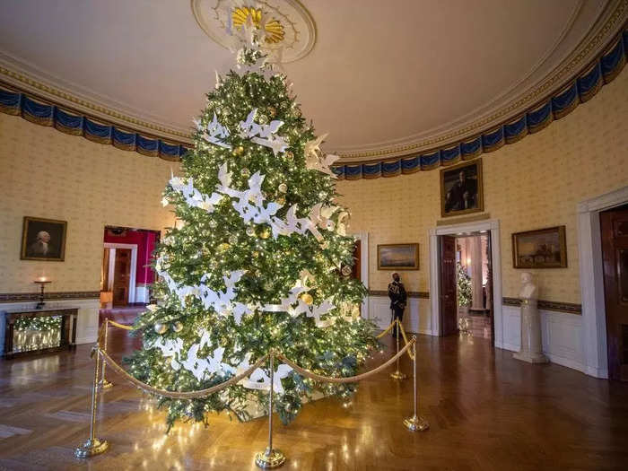 The official White House Christmas tree sits in the Blue Room.