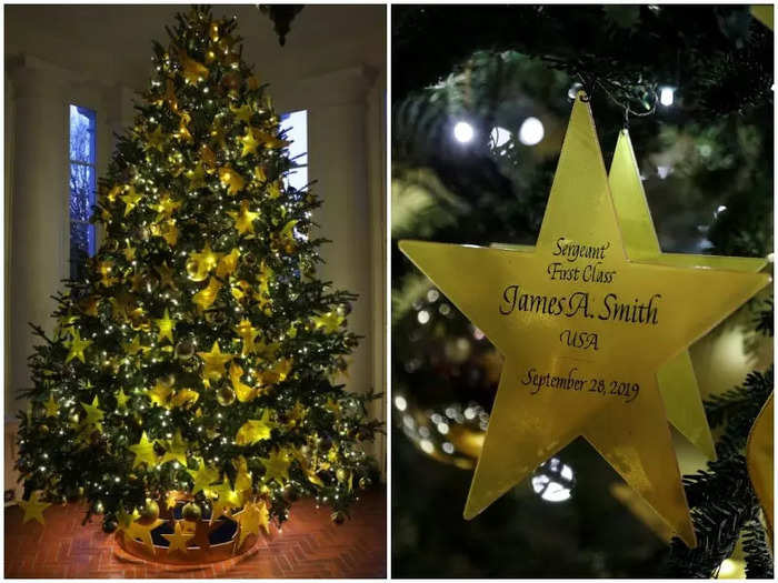 The Gold Star Tree in the East Landing honors fallen members of the US military with ornaments recognizing their names, ranks, and dates of death.