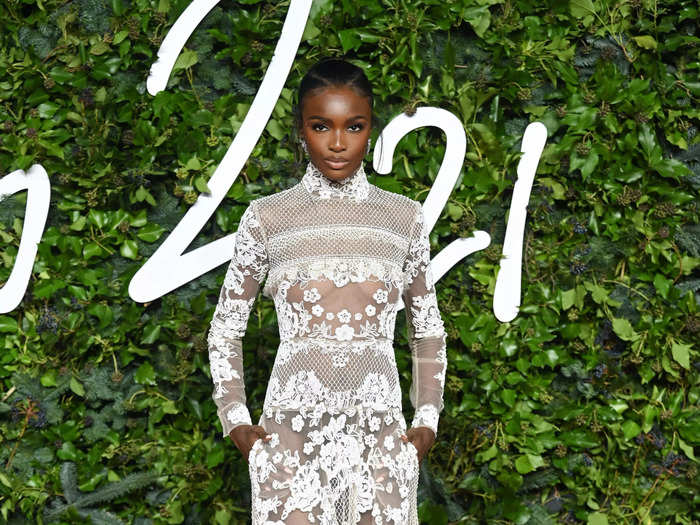 Leomie Anderson kept it chic with a sheer lace maxi dress.