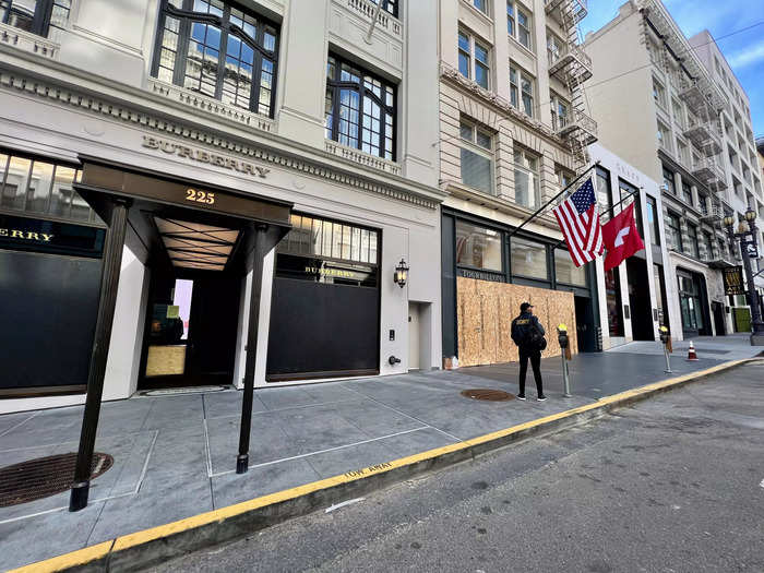 Burglarized Union Square stores boarded up broken windows, such as Burberry.