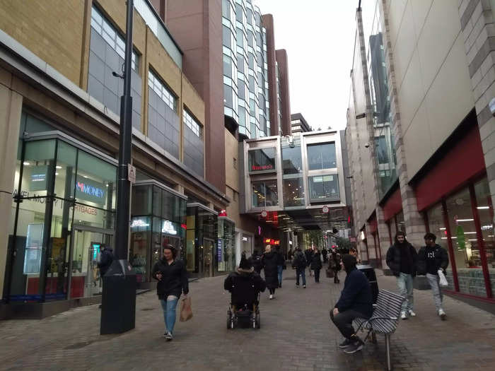 Some shoppers walking round the city center wore masks, but most didn