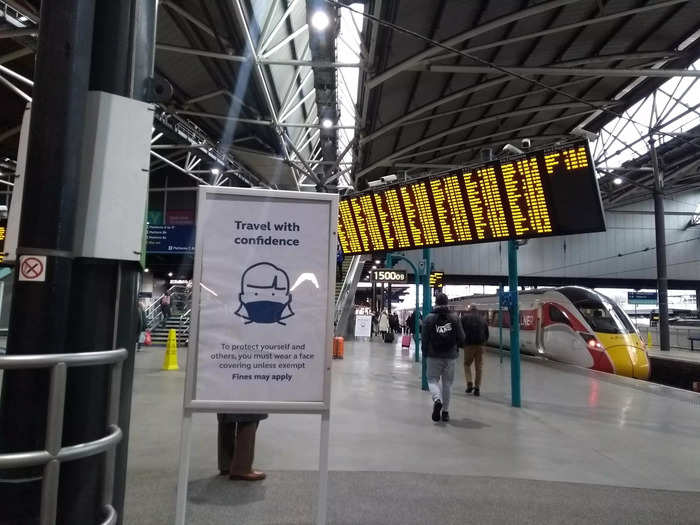 A large sign at Leeds train station reminded passengers that they needed to wear masks again.