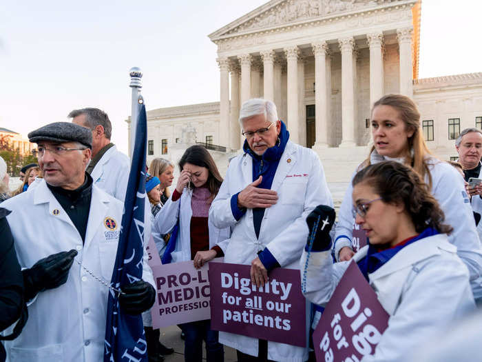 Some abortion opponents attended the protest in doctors uniforms.