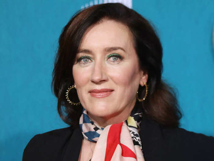 Maria Doyle Kennedy has brown hair like her character but it is a lot neater. She wears a wig for the show.