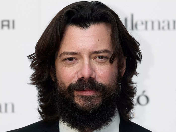 Álvaro Morte, best known for his role in "Money Heist," does have long hair and a beard outside the show but his hair is not as long as his character.