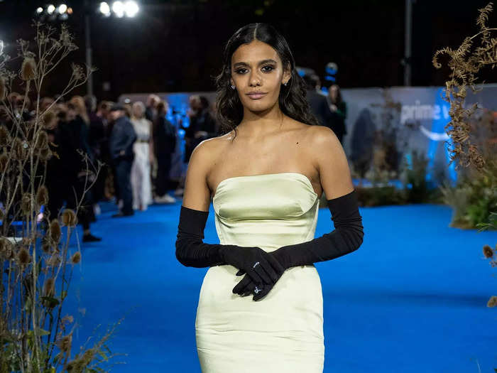 Madeleine Madden does not look too different from her character, though the 24-year-old Australian actress does have her hair braided like her character in the show. The braid is a key aspect of the Wisdoms in "The Wheel of Time."