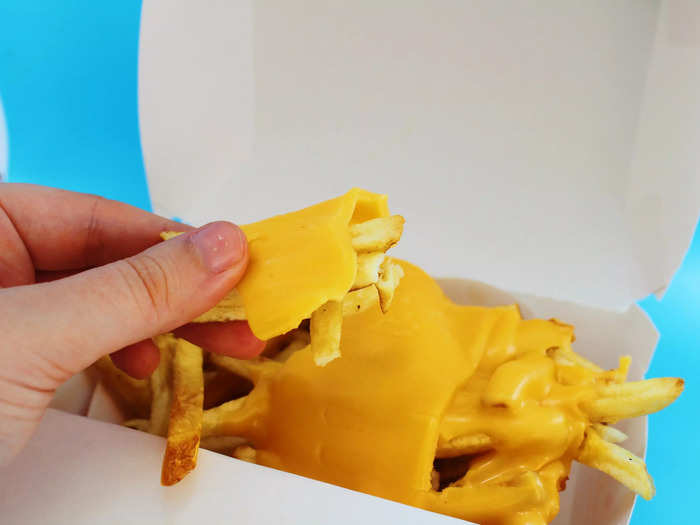 On the order I received, the cheese clung to the top layer of fries in an unappetizing way, at least to me.