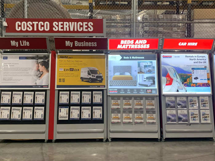 As customers lined up to show their sales slips to exit the store, Costco made one last push to market other member services such as discounted car hire or life insurance.