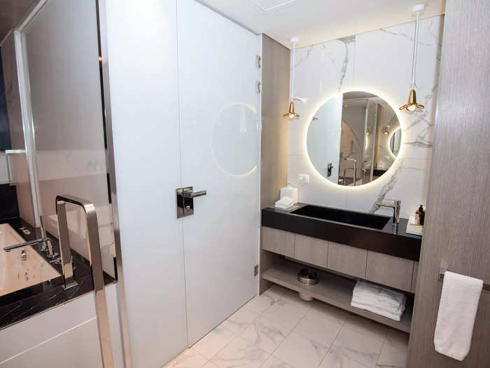 The bedroom also has a spacious and modern en-suite bathroom …