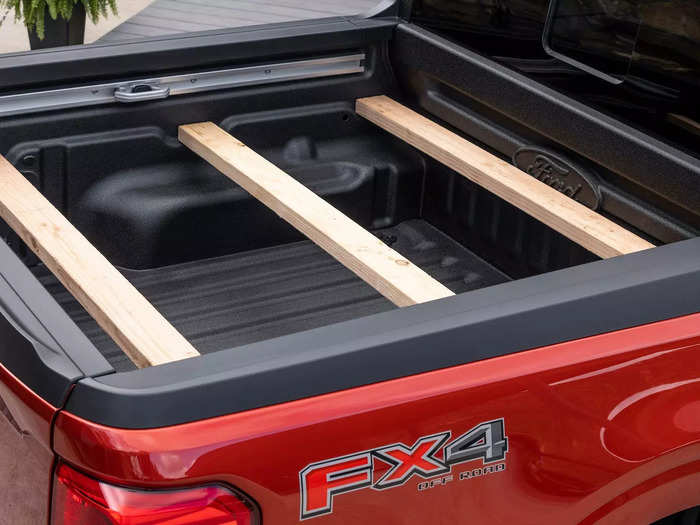 The Ford Maverick has a similar feature, but way more slots for wood.