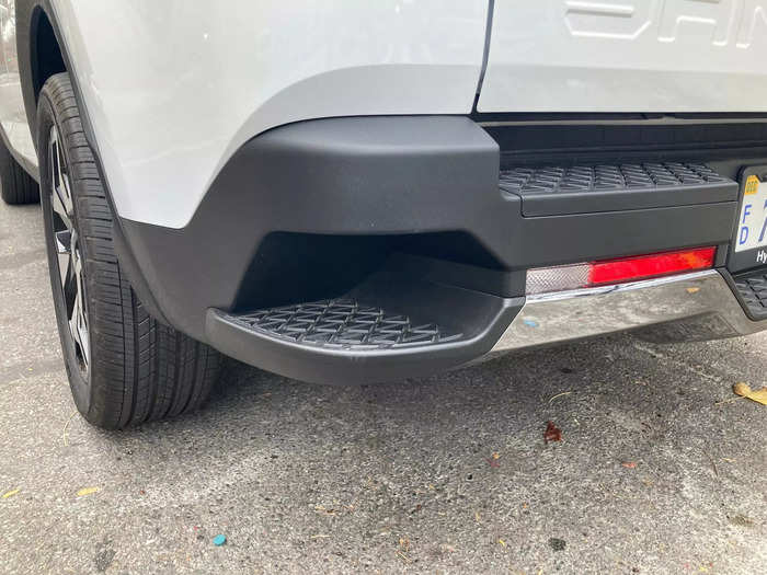 There are a few steps cleverly built into the bumper for reaching into the bed.