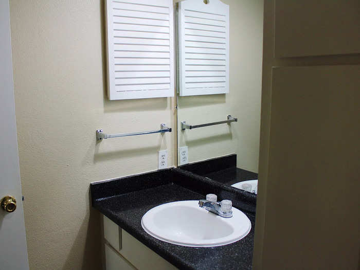 The bathroom was on the smaller side but featured plenty of storage for linens and necessities.