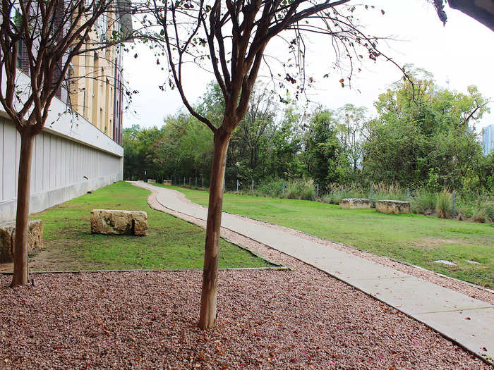 The apartment building is located right on the edge of the Colorado River, allowing residents to get out in nature.