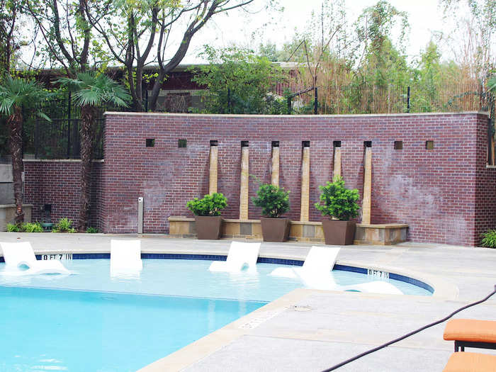 The apartment building also had a luxurious pool, gym, and lounge with free coffee.