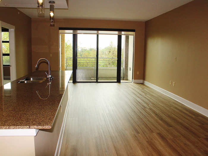 The living space was a generous size and let in a lot of light from the large windows and balcony.