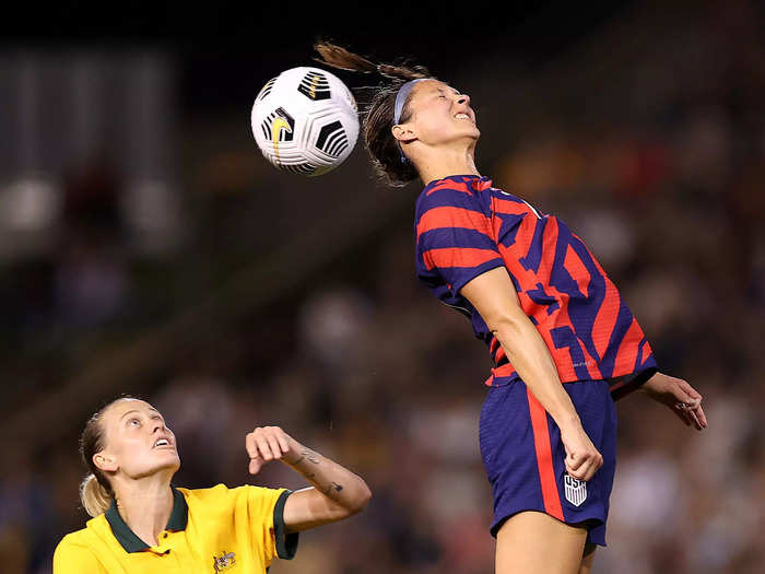 11/30: Ashley Hatch of the USWNT rises up for a header while competing against Australia.