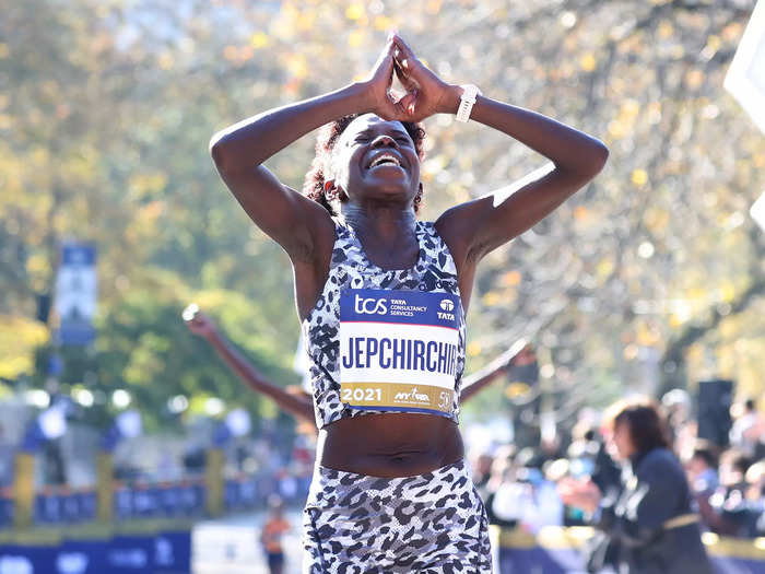 11/07: Peres Jepchirchir of Kenya celebrates as she crosses the finish line to win the 2021 New York City Marathon.