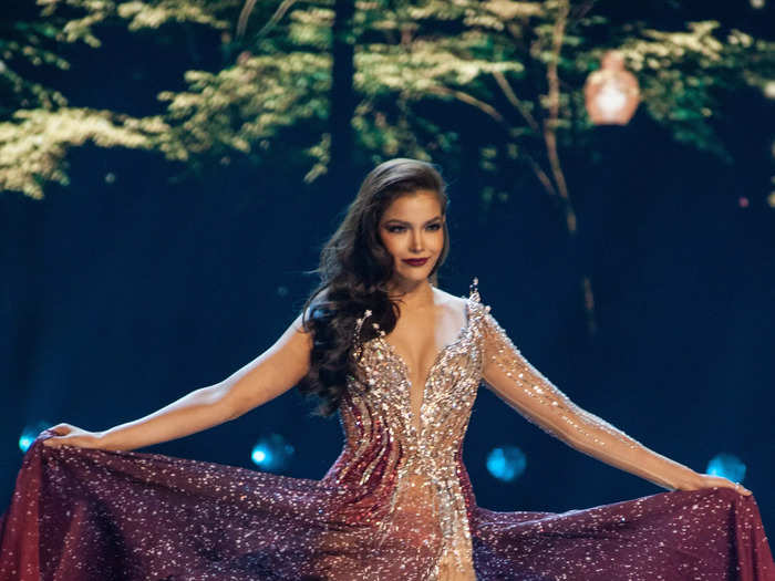 Miss Thailand Paweensuda Drouin wore a silver-and-red dress that was completely sheer on one side.