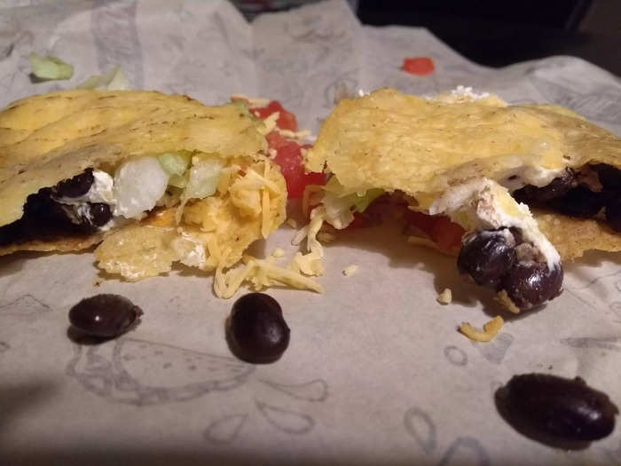 Inside, the taco was very similar to the Chalupa, and was the same price, too. Compared to a regular Taco Bell Crunchy Taco, the Supreme version cost £0.50 ($0.66)  more but the only difference was that it came with sour cream and tomatoes.