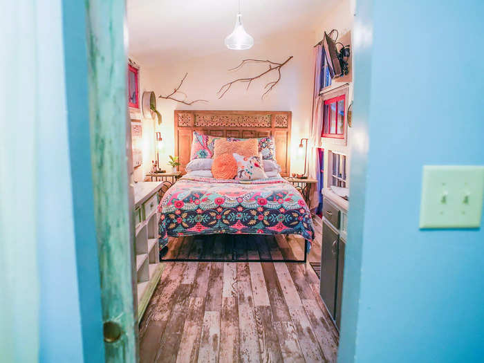 Past the kitchen, a sliding barn door leads to the bathroom, which I thought was a clever way to save the space that a swinging door would take up.