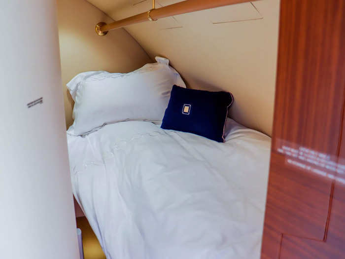 And just opposite the galley is the crew rest area, featuring two bunks for the flight crew to sleep on longer flights.