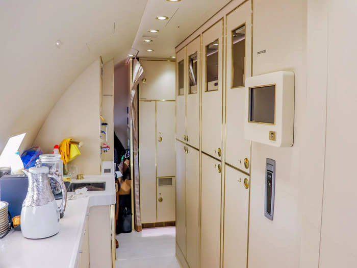 Behind the wood laminate walls are where flight attendants will work and sleep.