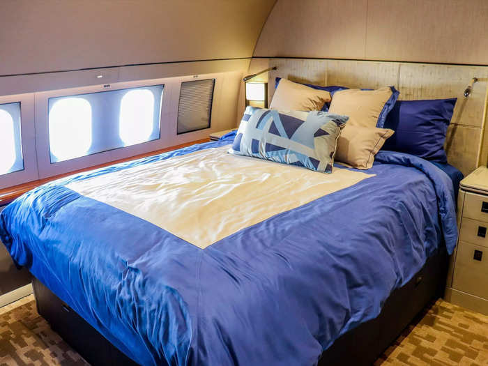 But the principal flyer has their own bedroom, complete with a queen-size bed.