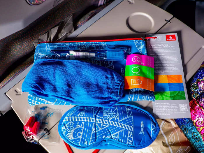 Economy class passengers also received an amenity kit include an eyeshade, socks, earplugs, and a dental kit. Stickers were also provided to let the crew know whether a passenger wanted to be woken up for meals or left alone during the flight.