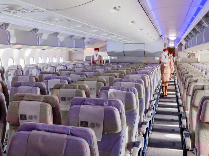 There are around 40 rows of economy class seats arranged in a 3-4-3 configuration spread across four compartments.