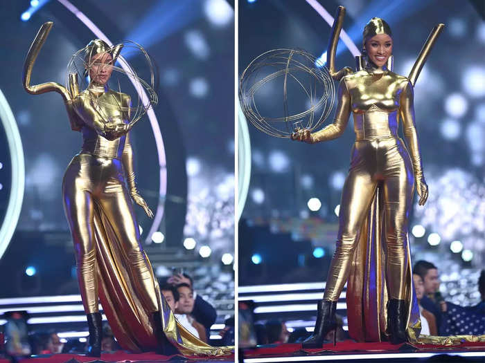 Elle Smith, the 2021 Miss USA, dressed as an Emmy Award for the Costume Show.