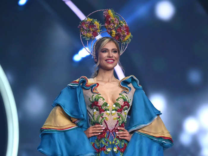 Miss Australia Daria Varlamova wowed in a voluminous blue gown with a towering flower headpiece.