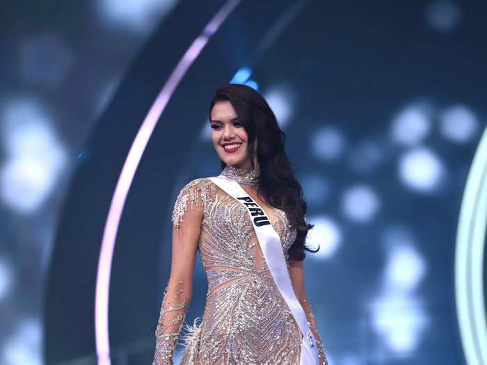 Miss Peru wore a striking silver dress that had sheer detailing all throughout.