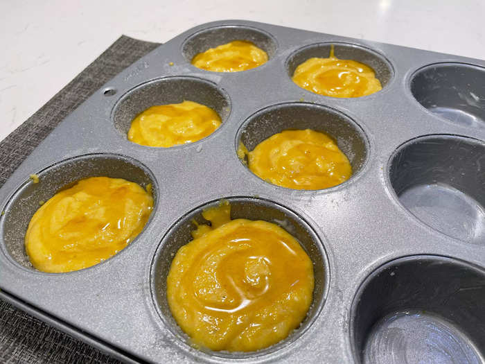 Kardashian squeezes honey on top of each piece of cornbread before putting it in the oven.