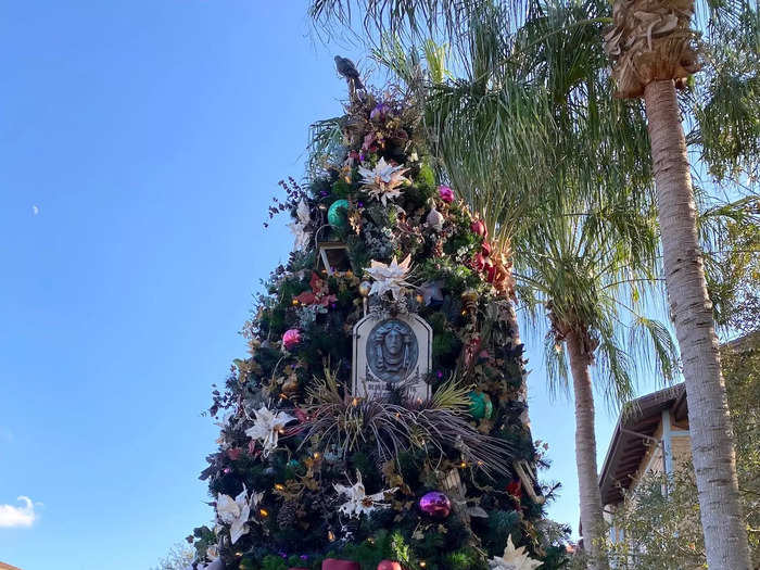 Some of the trees are decorated with movie decor, while others are inspired by Disney World rides like the Haunted Mansion.