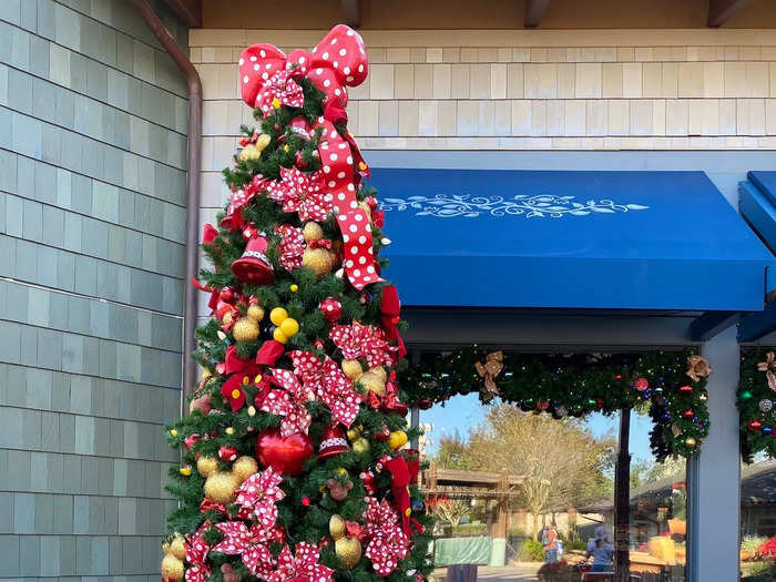 My favorite holiday activity at Disney Springs this year is the Christmas Tree Stroll.