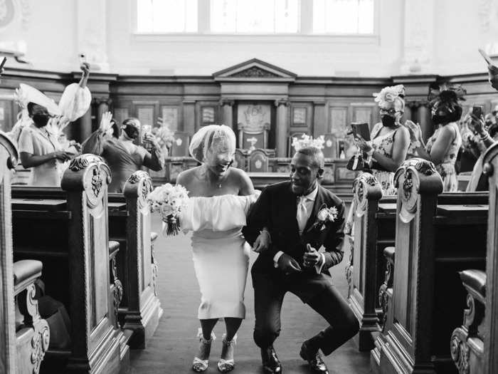 This new husband and wife busted a move walking down the aisle.