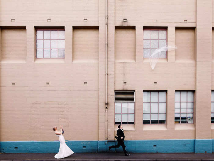 This candid moment of a veil flying away at a wedding in Melbourne, Australia, will bring a smile to your face.