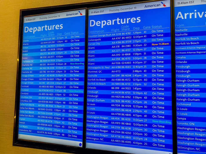 JetBlue departures are also displayed on flight status boards in the lounge as part of the new Northeast Alliance between JetBlue and American.