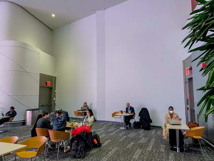 The shell of the bridge is largely complete and sits just behind a temporary wall in the terminal.