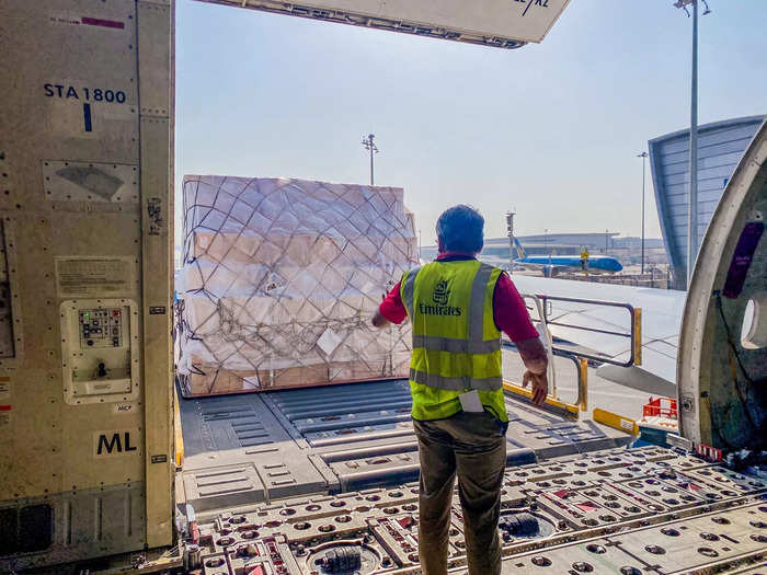 Onboard the aircraft, power-driven units allow ground handling staff to quickly move pallets around the aircraft. Workers don