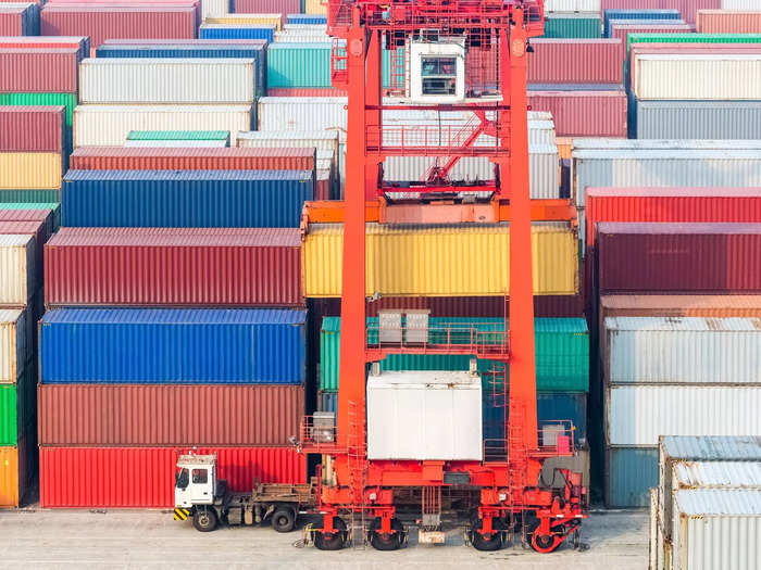 The shipping container is then moved to a terminal in the port. Where it is carefully stacked based on its destination and scheduled pickup. At the ports in Southern California the shipping containers can wait for weeks for a truck to come pick it up.