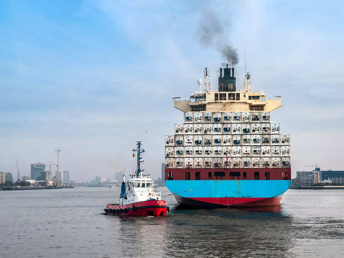 Once the port is ready to receive the ship, it is carefully guided into the port by a local harbor pilot who directs the crew and tugboats that attach to the side of the ship.