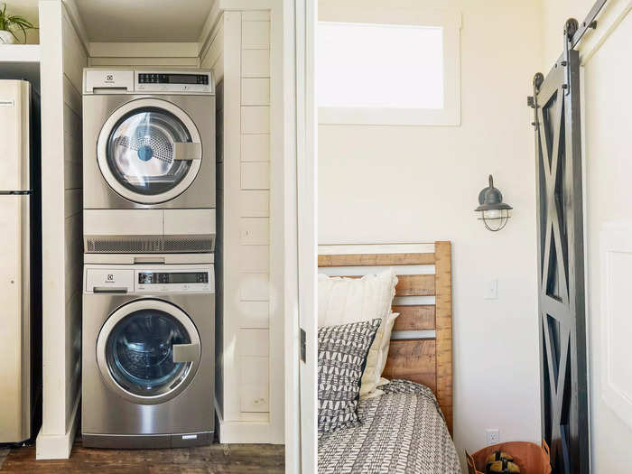 While touring the homes, I noticed space-saving hacks like stacked washers and dryers and sliding barn doors.